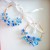 Light blue floral hoop earrings (1).jpeg